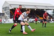 29 July 2022; Runar Hauge of Dundalk in action against Shane Elworthy of Longford Town during the Extra.ie FAI Cup First Round match between Dundalk and Longford Town at Oriel Park in Dundalk, Louth. Photo by Ben McShane/Sportsfile