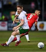 29 July 2022; Hugh Douglas of Bray Wanderers in action against Sean Boyd of Shelbourne during the Extra.ie FAI Cup First Round match between Bray Wanderers and Shelbourne at Carlisle Grounds in Bray, Wicklow. Photo by David Fitzgerald/Sportsfile