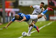 29 July 2022; Ethan Boyle of Finn Harps in action against Liam Burt of Bohemians during the Extra.ie FAI Cup First Round match between Finn Harps and Bohemians at Finn Park in Ballybofey, Donegal. Photo by Ramsey Cardy/Sportsfile