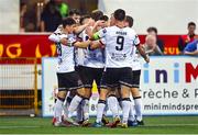 29 July 2022; Dundalk players celebrate their first goal, scored by Greg Sloggett, hidden, during the Extra.ie FAI Cup First Round match between Dundalk and Longford Town at Oriel Park in Dundalk, Louth. Photo by Ben McShane/Sportsfile
