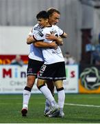 29 July 2022; Greg Sloggett of Dundalk celebrates with teammate Ryan O'Kane, who assisted, after scoring his side's fourth goal during the Extra.ie FAI Cup First Round match between Dundalk and Longford Town at Oriel Park in Dundalk, Louth. Photo by Ben McShane/Sportsfile
