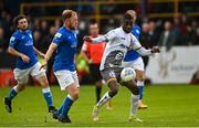 29 July 2022; Junior Ogedi Uzokwe of Bohemians in action against Ryan Connolly of Finn Harps during the Extra.ie FAI Cup First Round match between Finn Harps and Bohemians at Finn Park in Ballybofey, Donegal. Photo by Ramsey Cardy/Sportsfile