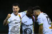 29 July 2022; Junior Ogedi Uzokwe of Bohemians, centre, is congratulated by teammates Josh Kerr, left, and John O'Sullivan after scoring his side's third goal during the Extra.ie FAI Cup First Round match between Finn Harps and Bohemians at Finn Park in Ballybofey, Donegal. Photo by Ramsey Cardy/Sportsfile