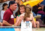 30 July 2022; Clodagh Gill of Team Ireland with her parents Peter and Loreta after competing in the girls 3000m final during day six of the 2022 European Youth Summer Olympic Festival at Banská Bystrica, Slovakia. Photo by Eóin Noonan/Sportsfile