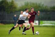 30 July 2022; Olivia Shannon of Wexford & District Women’s League in action against Daisy O’Connell of Galway District League during the FAI Women's Under-19 InterLeague Cup Final match between Galway District League and Wexford & District Women's League at Leah Victoria Park in Tullamore, Offaly. Photo by Seb Daly/Sportsfile