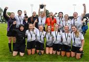 30 July 2022; Wexford & District Women's League captain Katie Murphy lifts the trophy alongside her teammates after their side's victory in the FAI Women's Under-19 InterLeague Cup Final match between Galway District League and Wexford & District Women's League at Leah Victoria Park in Tullamore, Offaly. Photo by Seb Daly/Sportsfile