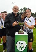 30 July 2022; Wexford & District Women’s League captain Katie Murphy is presented with the trophy by FAI Director of Competitions Fran Gavin after the FAI Women's Under-19 InterLeague Cup Final match between Galway District League and Wexford & District Women's League at Leah Victoria Park in Tullamore, Offaly. Photo by Seb Daly/Sportsfile