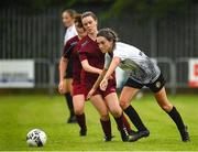 30 July 2022; Hannah Kehoe of Wexford & District Women’s League in action against Daisy O’Connell of Galway District League during the FAI Women's Under-19 InterLeague Cup Final match between Galway District League and Wexford & District Women's League at Leah Victoria Park in Tullamore, Offaly. Photo by Seb Daly/Sportsfile