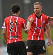 30 July 2022; Mark Connolly, right, and Declan Glass of Derry City during the Extra.ie FAI Cup First Round match between Derry City and Oliver Bond Celtic at Ryan McBride Brandywell Stadium in Derry. Photo by Ramsey Cardy/Sportsfile