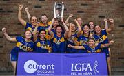 30 July 2022; Parnells from London celebrate with the cup after victory over Carrickedmond of Longford in the Currentaccount.ie All-Ireland Ladies Football Intermediate Club 7-a-side championship final at Naomh Mearnóg's GAA club in Dublin. Photo by Brendan Moran/Sportsfile