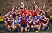 30 July 2022; The Kilkerrin Clonberne and Annaghdown teams from Galway celebrate with their cups after winning the Currentaccount.ie All-Ireland Ladies Football Senior Club 7-a-side championship and Intermediate shield finals at Naomh Mearnóg's GAA club in Dublin. Photo by Brendan Moran/Sportsfile