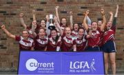 30 July 2022; The Annaghdown team from Galway celebrate victory over Omagh St Enda's of Tyrone in the Currentaccount.ie All-Ireland Ladies Football Intermediate Club 7-a-side shield final at Naomh Mearnóg's GAA club in Dublin. Photo by Brendan Moran/Sportsfile