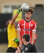 30 July 2022; Oliver Bond Celtic goalkeeper Jake Carey and Cameron McJannet of Derry City during the Extra.ie FAI Cup First Round match between Derry City and Oliver Bond Celtic at Ryan McBride Brandywell Stadium in Derry. Photo by Ramsey Cardy/Sportsfile