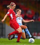 30 July 2022; Emma Hansberry of Sligo Rovers is tackled by Rachel Graham of Shelbourne during the SSE Airtricity Women's National League match between Sligo Rovers and Shelbourne at The Showgrounds in Sligo. Photo by Ben McShane/Sportsfile