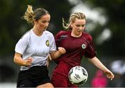 30 July 2022; Alannah O’Connor of Galway District League in action against Katie Murphy of Wexford & District Women’s League during the FAI Women's Under-19 InterLeague Cup Final match between Galway District League and Wexford & District Women's League at Leah Victoria Park in Tullamore, Offaly. Photo by Seb Daly/Sportsfile