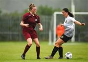 30 July 2022; Catlin Mullen of Galway District League in action against Hannah Redmond of Wexford & District Women’s League during the FAI Women's Under-19 InterLeague Cup Final match between Galway District League and Wexford & District Women's League at Leah Victoria Park in Tullamore, Offaly. Photo by Seb Daly/Sportsfile