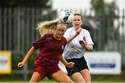 30 July 2022; Ellen Conlon of Galway District League in action against Aoife McEldowney of Wexford & District Women’s League during the FAI Women's Under-19 InterLeague Cup Final match between Galway District League and Wexford & District Women's League at Leah Victoria Park in Tullamore, Offaly. Photo by Seb Daly/Sportsfile
