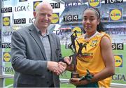 31 July 2022; Lara Dahunsi of Antrim is presented with the TG4 Player of the match by TG4 Head of Sport Rónán Ó Coisdealbha after the TG4 All-Ireland Ladies Football Junior Championship Final match between Antrim and Fermanagh at Croke Park in Dublin. Photo by Brendan Moran/Sportsfile