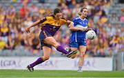 31 July 2022; Clara Donnelly of Wexford in action against Ellen Healy of Laois during the TG4 All-Ireland Ladies Football Intermediate Championship Final match between Laois and Wexford at Croke Park in Dublin. Photo by Brendan Moran/Sportsfile