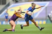 31 July 2022; Mo Nerney of Laois in action against Orlagh Kehoe of Wexford during the TG4 All-Ireland Ladies Football Intermediate Championship Final match between Laois and Wexford at Croke Park in Dublin. Photo by Ramsey Cardy/Sportsfile