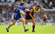 31 July 2022; Laura Marie Maher of Laois in action against Clara Donnelly of Wexford during the TG4 All-Ireland Ladies Football Intermediate Championship Final match between Laois and Wexford at Croke Park in Dublin. Photo by Brendan Moran/Sportsfile