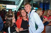 31 July 2022; Sean Cronin Of Team Ireland with his mother Karen after arriving home from the 2022 European Youth Summer Olympic Festival at Dublin Airport in Dublin. Photo by Eóin Noonan/Sportsfile