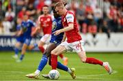 31 July 2022; Mark Doyle of St Patrick's Athletic is fouled by Tunmise Sobowale of Waterford, resulting in a penalty, during the Extra.ie FAI Cup First Round match between St Patrick's Athletic and Waterford at Richmond Park in Dublin. Photo by Seb Daly/Sportsfile