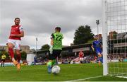 31 July 2022; Ronan Coughlan of St Patrick's Athletic shoots wide, under pressure from Waterford goalkeeper Paul Martin, during the Extra.ie FAI Cup First Round match between St Patrick's Athletic and Waterford at Richmond Park in Dublin. Photo by Seb Daly/Sportsfile