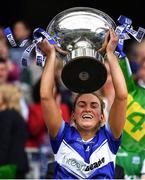 31 July 2022; Laois captain Aimee Kelly lifts the Mary Quinn Memorial Cup after her side's victory in the TG4 All-Ireland Ladies Football Intermediate Championship Final match between Laois and Wexford at Croke Park in Dublin. Photo by Piaras Ó Mídheach/Sportsfile