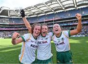 31 July 2022; Meath players, from left, Emma Duggan, Máire O'Shaughnessy and Vikki Wall celebrate after their side's victory in the TG4 All-Ireland Ladies Football Senior Championship Final match between Kerry and Meath at Croke Park in Dublin. Photo by Piaras Ó Mídheach/Sportsfile