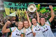 31 July 2022; Meath players, from left, Kelsey Nesbitt, Katie Newe, Niamh O'Sullivan and Orla Byrne celebrate with the Brendan Martin Cup after the TG4 All-Ireland Ladies Football Senior Championship Final match between Kerry and Meath at Croke Park in Dublin. Photo by Ramsey Cardy/Sportsfile