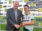 31 July 2022; Niamh O'Sullivan of Meath is presented with the TG4 Player of the match award by TG4 Head of Sport Rónán Ó Coisdealbha after the TG4 All-Ireland Ladies Football Senior Championship Final match between Kerry and Meath at Croke Park in Dublin. Photo by Brendan Moran/Sportsfile
