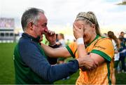 31 July 2022; An emotional Meath manager Eamonn Murray and goalkeeper Monica McGuirk after the TG4 All-Ireland Ladies Football Senior Championship Final match between Kerry and Meath at Croke Park in Dublin. Photo by Ramsey Cardy/Sportsfile