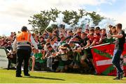 31 July 2022; The supporters fence gives way as Cork City supporters celebrate their side's first goal scored by Ruairi Keating during the Extra.ie FAI Cup First Round match between Cobh Ramblers and Cork City at St Colman's Park in Cobh, Cork. Photo by Michael P Ryan/Sportsfile