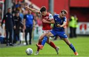 31 July 2022; Adam O'Reilly of St Patrick's Athletic in action against Shane Griffin of Waterford during the Extra.ie FAI Cup First Round match between St Patrick's Athletic and Waterford at Richmond Park in Dublin. Photo by Seb Daly/Sportsfile