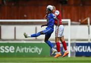 31 July 2022; Junior Quitirna of Waterford in action against Tom Grivosti of St Patrick's Athletic during the Extra.ie FAI Cup First Round match between St Patrick's Athletic and Waterford at Richmond Park in Dublin. Photo by Seb Daly/Sportsfile