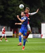 31 July 2022; Shane Griffin of Waterford in action against Jamie Lennon of St Patrick's Athletic during the Extra.ie FAI Cup First Round match between St Patrick's Athletic and Waterford at Richmond Park in Dublin. Photo by Seb Daly/Sportsfile