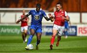 31 July 2022; Tunmise Sobowale of Waterford in action against Ronan Coughlan of St Patrick's Athletic during the Extra.ie FAI Cup First Round match between St Patrick's Athletic and Waterford at Richmond Park in Dublin. Photo by Seb Daly/Sportsfile