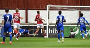 31 July 2022; Wassim Aouachria of Waterford, left, scores his side's first goal, past St Patrick's Athletic goalkeeper Joseph Anang, during the Extra.ie FAI Cup First Round match between St Patrick's Athletic and Waterford at Richmond Park in Dublin. Photo by Seb Daly/Sportsfile