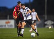 29 July 2022; Joe Adams of Dundalk and Dean McMenamy of Longford Town during the Extra.ie FAI Cup First Round match between Dundalk and Longford Town at Oriel Park in Dundalk, Louth. Photo by Ben McShane/Sportsfile