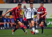 29 July 2022; Steven Bradley of Dundalk and Mick McDonnell of Longford Town during the Extra.ie FAI Cup First Round match between Dundalk and Longford Town at Oriel Park in Dundalk, Louth. Photo by Ben McShane/Sportsfile