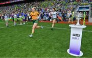 31 July 2022; Monica McGuirk, left, and Máire O'Shaughnessy of Meath run out past the Brendan Martin cup before the TG4 All-Ireland Ladies Football Senior Championship Final match between Kerry and Meath at Croke Park in Dublin. Photo by Brendan Moran/Sportsfile