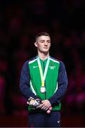 1 August 2022; Rhys McClenaghan of Northern Ireland, collects his Silver medal after competing in the men's pommel horse final at Arena Birmingham in Birmingham, England. Photo by Paul Greenwood/Sportsfile