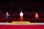 1 August 2022; Athletes, from left, Rhys McClenaghan of Northern Ireland with his Silver medal, Joe Fraser of England with his Gold medal and Jayson Rampersad of Canada with his Bronze medal after competing in the men's pommel horse final at Arena Birmingham in Birmingham, England. Photo by Paul Greenwood/Sportsfile