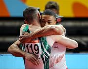 1 August 2022; Rhys McClenaghan of Northern Ireland and Joe Fraser of England embrace after competing in the men's pommel horse final at Arena Birmingham in Birmingham, England. Photo by Paul Greenwood/Sportsfile