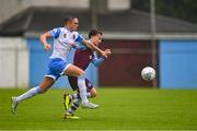 1 August 2022; Darragh Markey of Drogheda United in action against Evan Caffrey of UCD during the SSE Airtricity League Premier Division match between Drogheda United and UCD at Head in the Game Park in Drogheda, Louth. Photo by Ben McShane/Sportsfile