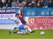 1 August 2022; Dayle Rooney of Drogheda United is tackled by Alex Dunne of UCD during the SSE Airtricity League Premier Division match between Drogheda United and UCD at Head in the Game Park in Drogheda, Louth. Photo by Ben McShane/Sportsfile