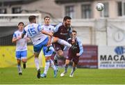 1 August 2022; Gary Deegan of Drogheda United is fouled by Alex Dunne of UCD during the SSE Airtricity League Premier Division match between Drogheda United and UCD at Head in the Game Park in Drogheda, Louth. Photo by Ben McShane/Sportsfile