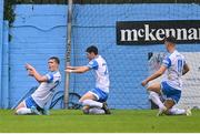 1 August 2022; Thomas Lonergan, left, of UCD celebrates with teammates, John Ryan, centre, and Dylan Duffy after scoring his side's first goal during the SSE Airtricity League Premier Division match between Drogheda United and UCD at Head in the Game Park in Drogheda, Louth. Photo by Ben McShane/Sportsfile