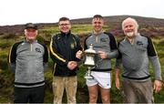 1 August 2022; Killian Phelan of Kilkenny with, from left, National Poc Fada Committee Cathaoirleach Tom Ryan, Ard Stiúrthóir of the GAA Tom Ryan and event sponsor Martin Donnelly after the M. Donnelly GAA All-Ireland Poc Fada Finals at Cooley Mountains in Louth. Photo by Harry Murphy/Sportsfile